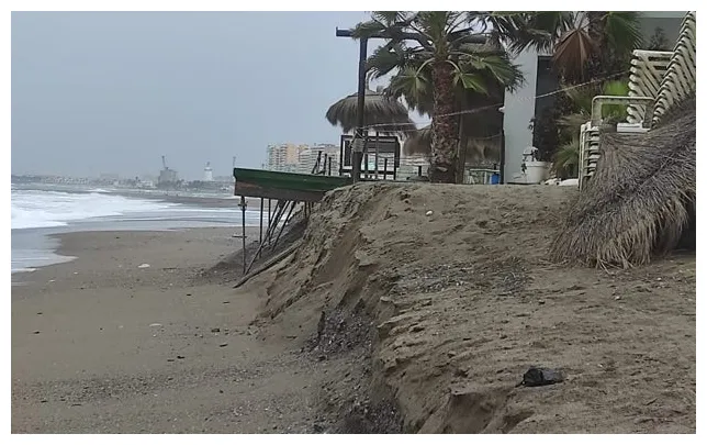 Clean up begins after four-metre-high waves and gale-force winds batter