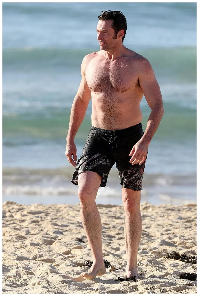 Hunky hugh! jackman shows off rock hard abs