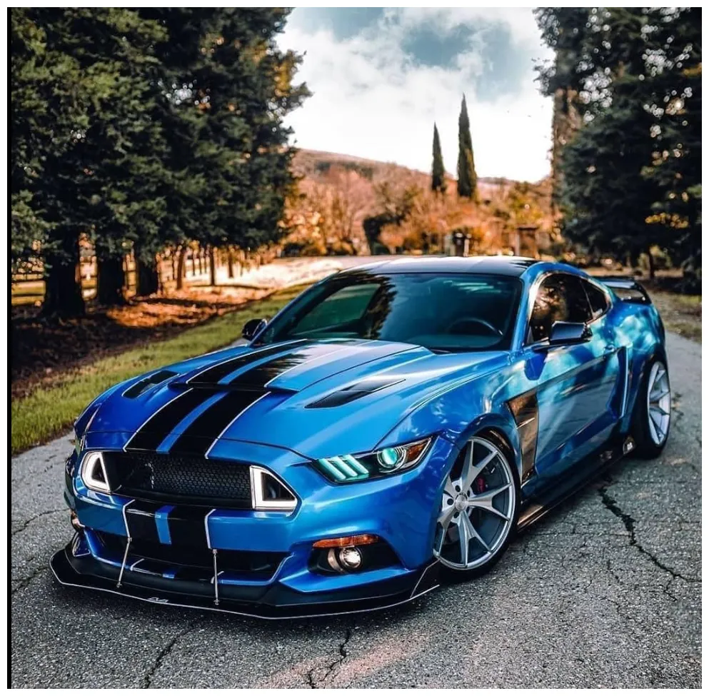 Blue Camaro SS parked on the side of a road