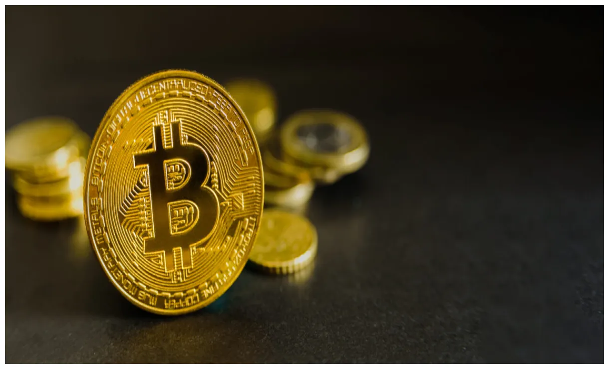 Bitcoin, ether fall in broad crypto pull back; memecoins reverse gains