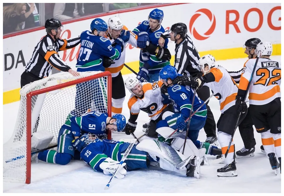 Vancouver canucks dominate slumping philadelphia flyers