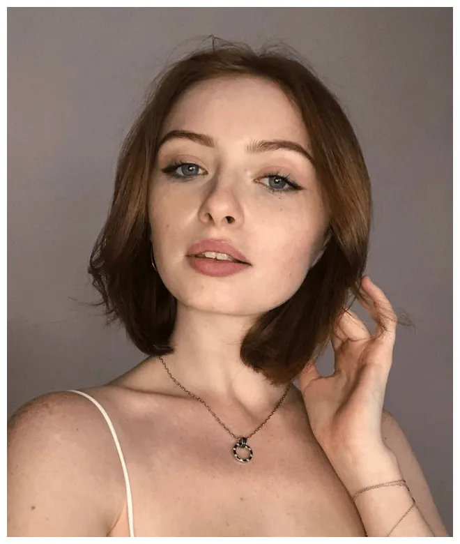 Face of a blue eyed readhead girl r/faces