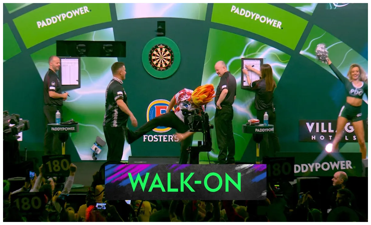 Jokingly kicks luke woodhouse on stage during walk-on