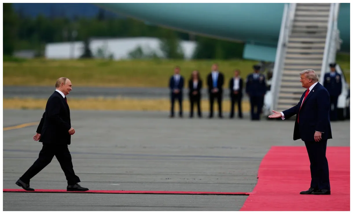 Donald Trump and Vladimir Putin shake hands in Alaska as Ukraine war