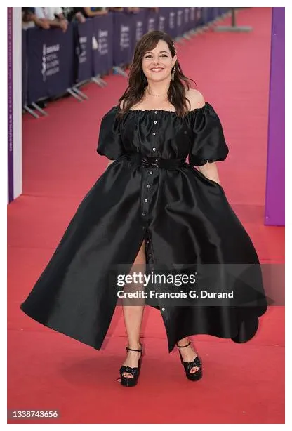 Attends the "une femme du monde" red carpet during the