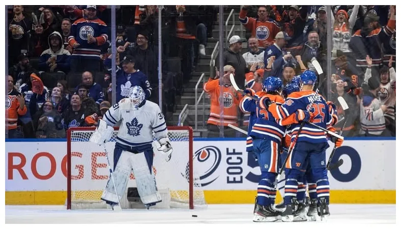 Oilers win team-record 11th straight, rally to beat skidding maple