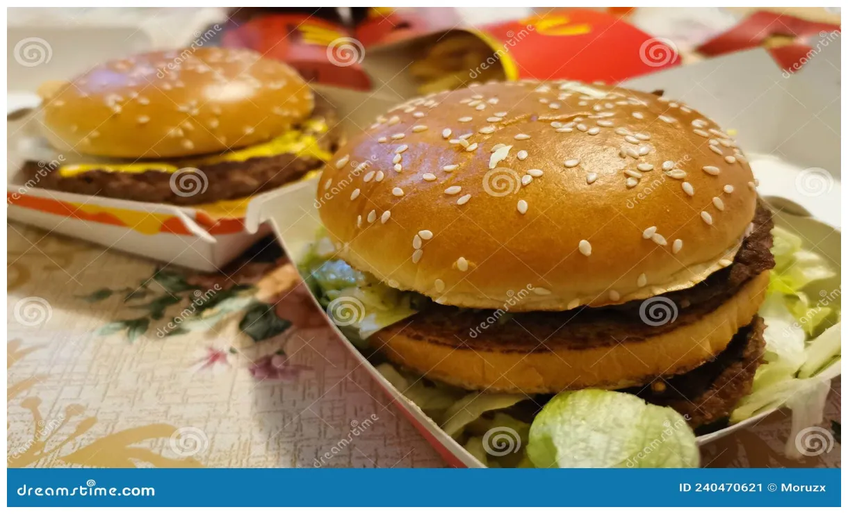 Picture of restaurant logo in the middle of tropical plants