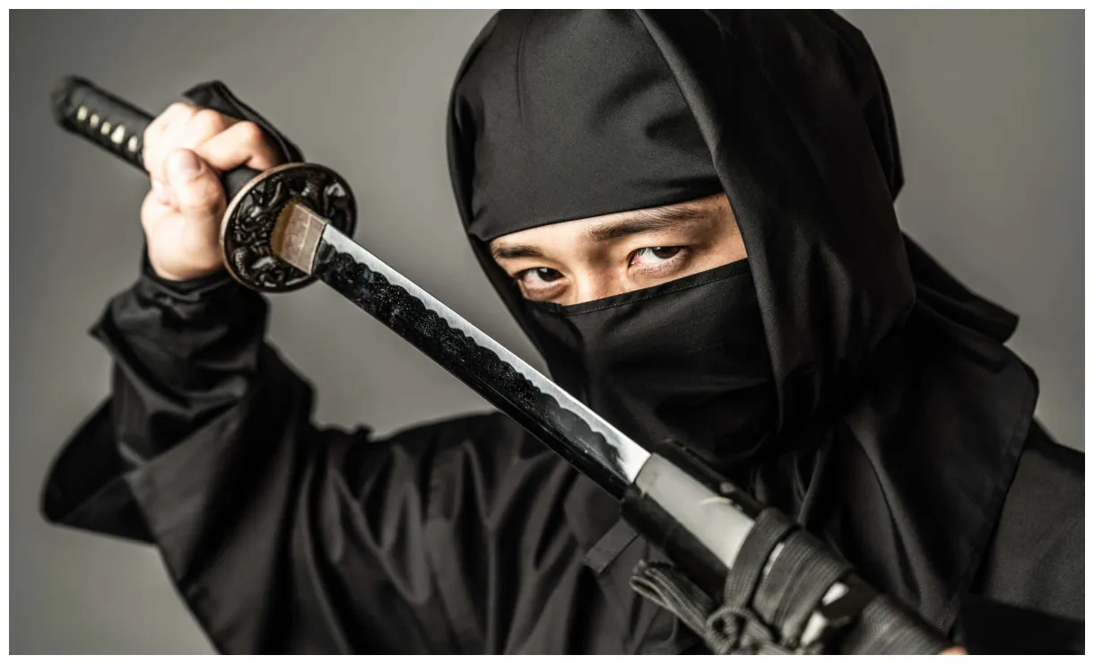 Download a in black holding a sword s