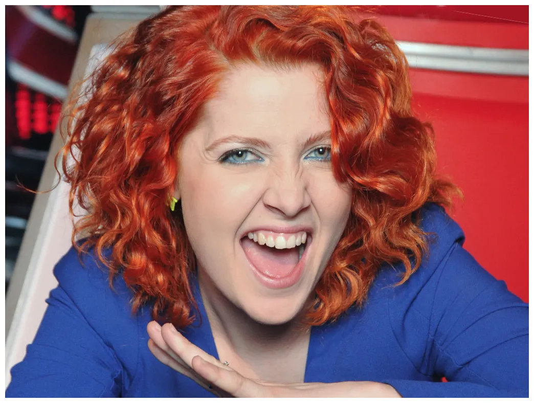 Classify roman red-headed singer noemi