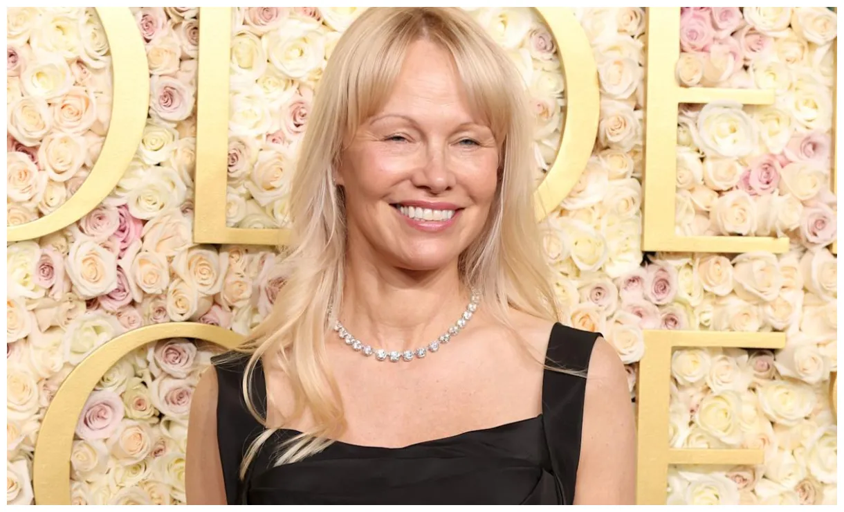 Wears elbow-length gloves and diamonds at the 2025