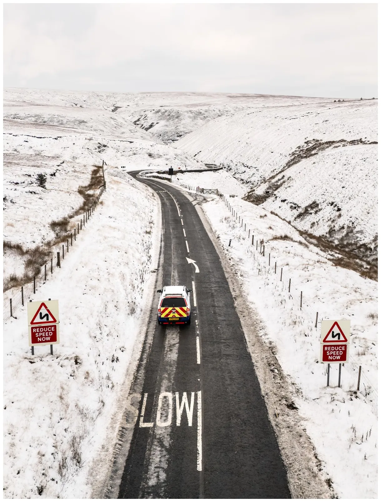 Ice warning issued after heavy snow sparks travel chaos and school